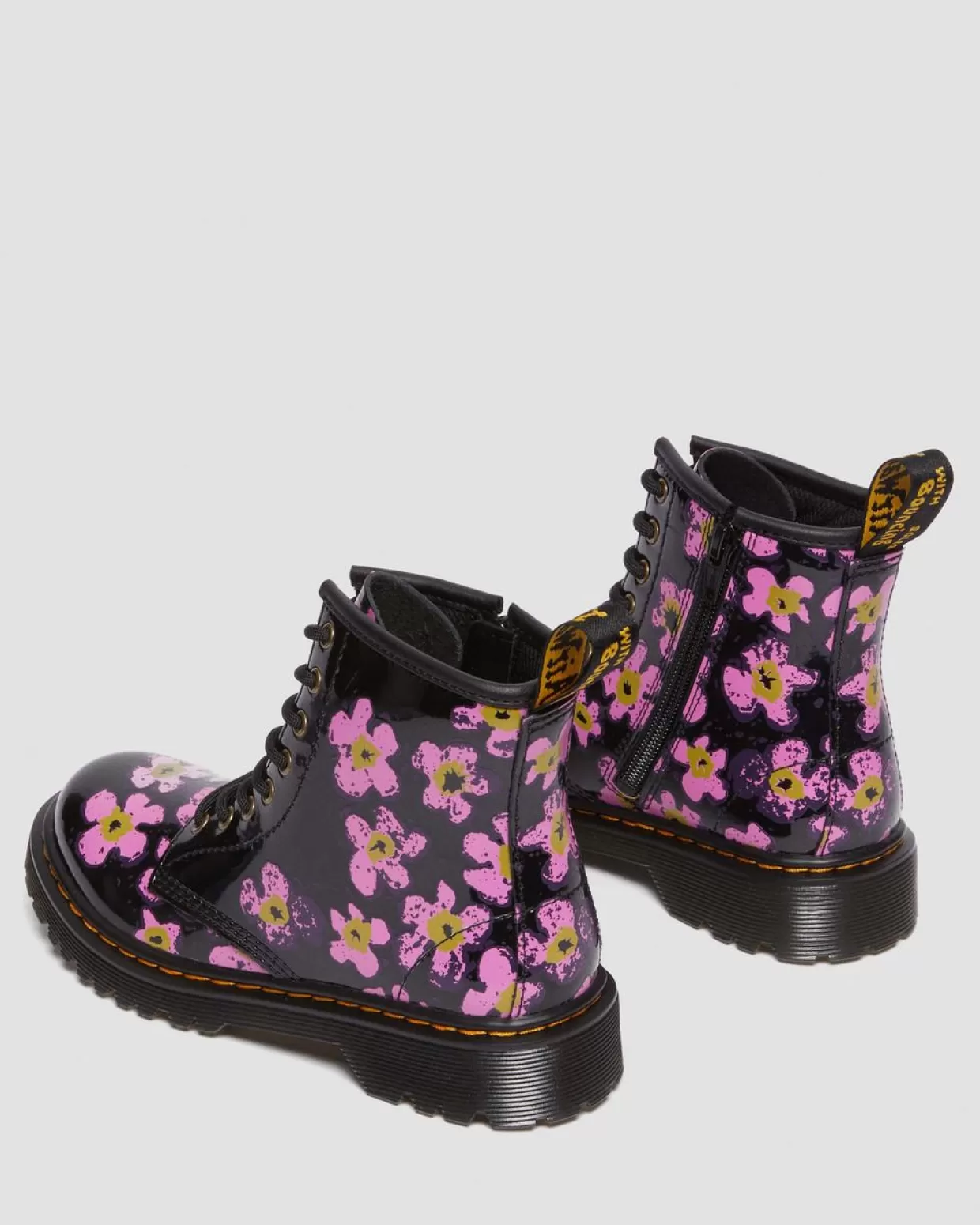 KIDS Dr. Martens Stivali 1460 junior in pelle verniciata con motivi floreali