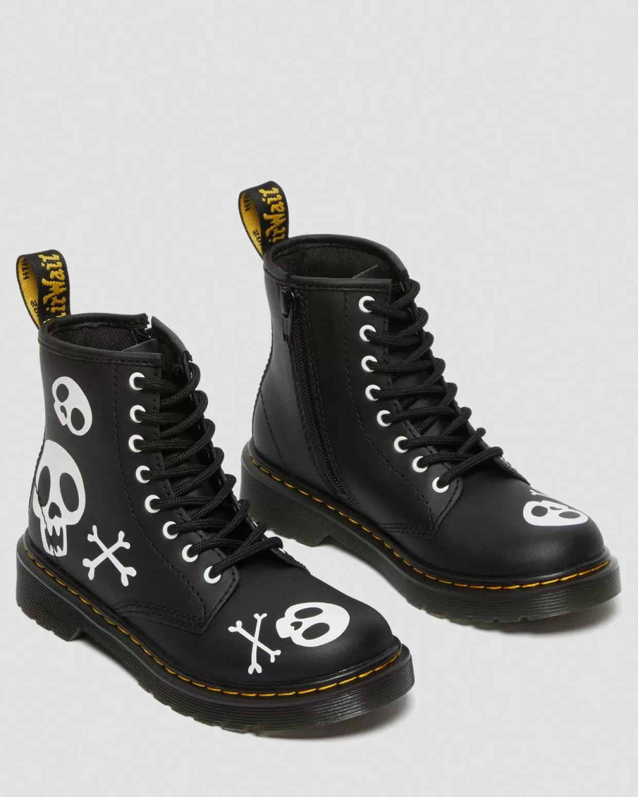 Dr. Martens Stivali stringati Junior in pelle 1460 Skull & Bones